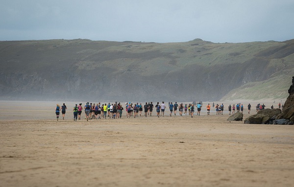 Runners on Perranporth Beach